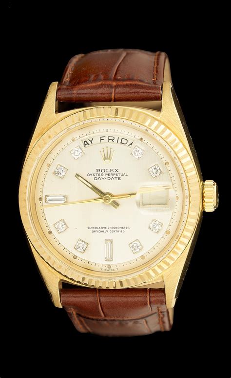 rolex day date wrist watch